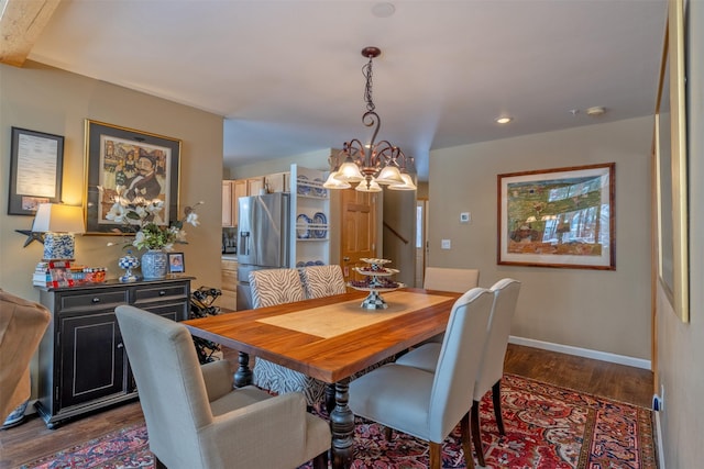 dining space featuring a chandelier, baseboards, dark wood finished floors, and recessed lighting