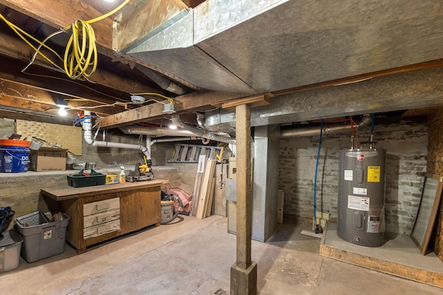 basement featuring electric water heater