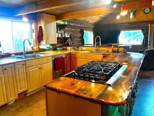 kitchen with butcher block countertops, log walls, stainless steel dishwasher, and sink