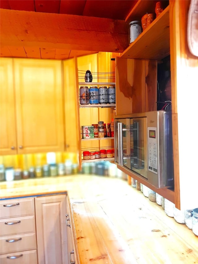 kitchen featuring butcher block countertops