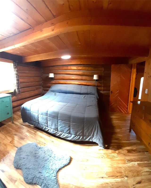 bedroom with hardwood / wood-style flooring, rustic walls, wooden ceiling, and beam ceiling