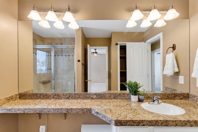 bathroom with vanity and walk in shower