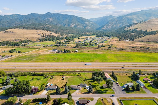 aerial view featuring a mountain view and a rural view