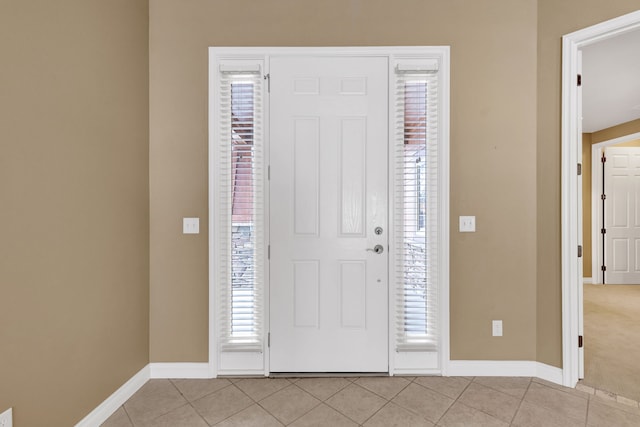 entryway featuring light tile patterned floors