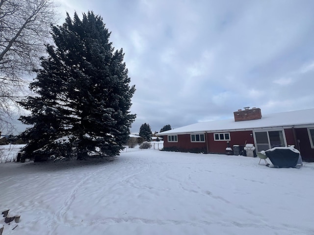 view of snowy yard