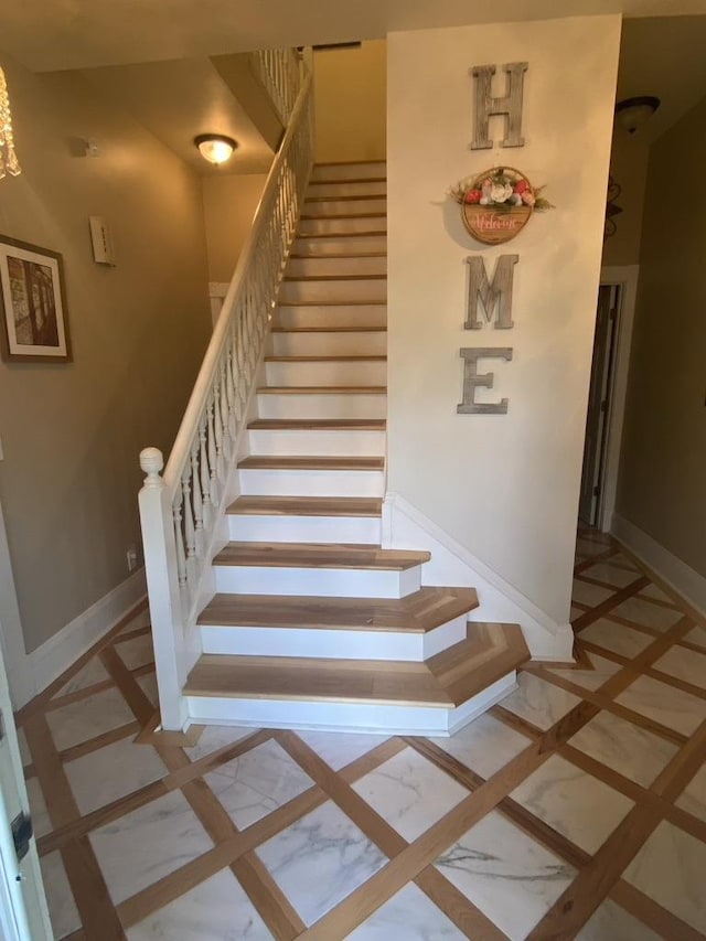 stairway with baseboards