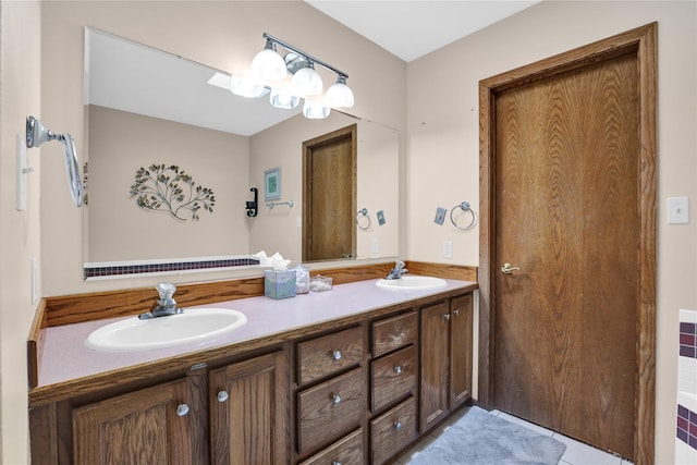 bathroom with vanity and tile patterned floors