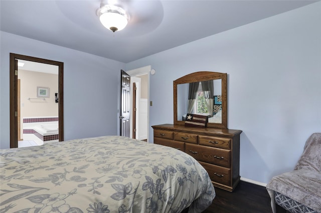 bedroom with ceiling fan and dark hardwood / wood-style flooring