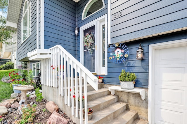 property entrance featuring a garage