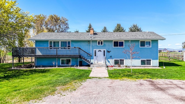 35011 Little Marten Rd, Ronan, MT 59864 - bi-level home featuring a deck and a chimney