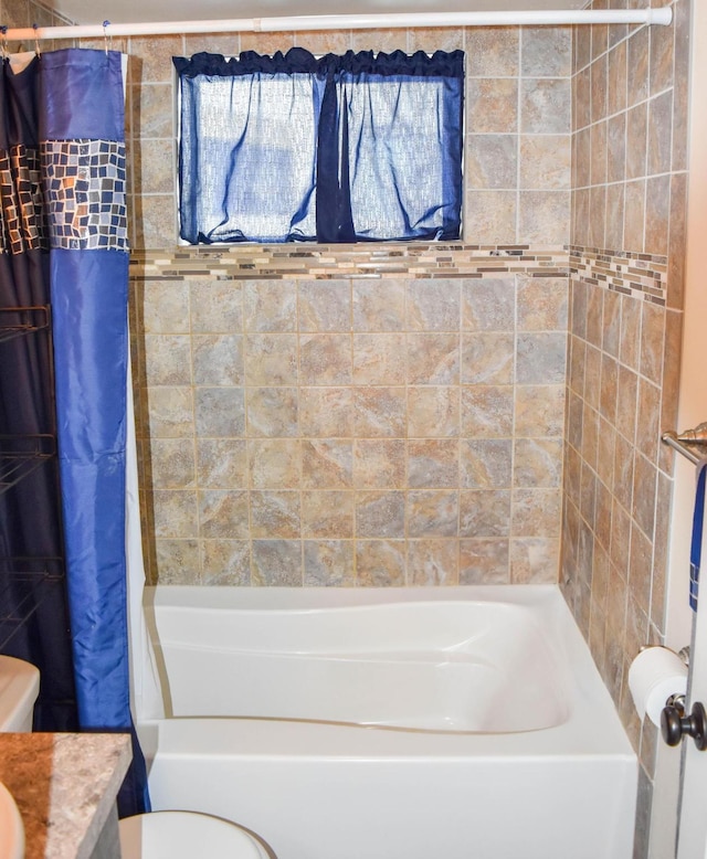 full bathroom featuring vanity, toilet, and shower / bath combo with shower curtain