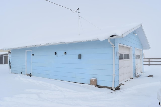 view of snow covered property