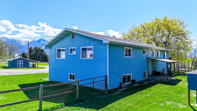 35011 Little Marten Rd, Ronan, MT 59864 - view of side of home with a mountain view