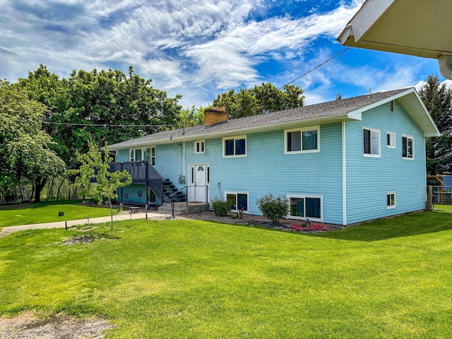 35011 Little Marten Rd, Ronan, MT 59864 - back of house featuring a chimney and a lawn