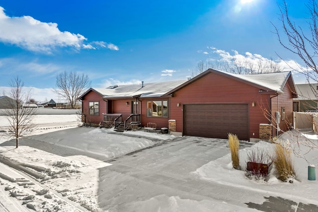 single story home featuring a garage