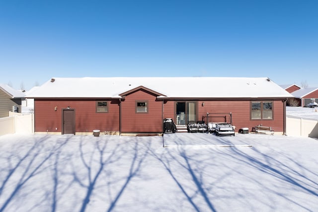 view of snow covered property