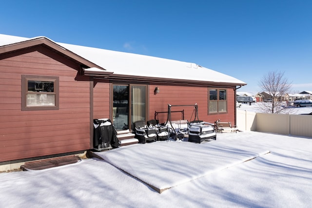 view of snow covered property