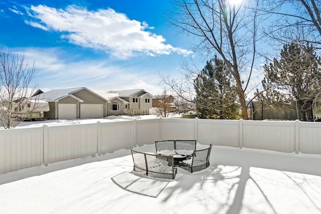 view of snow covered patio