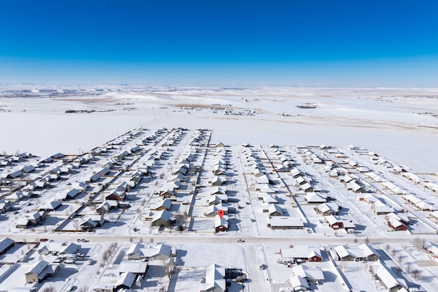 view of snow covered property