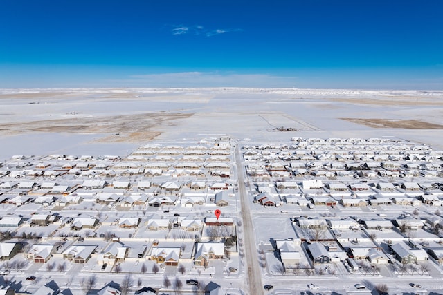 surrounding community with a water view and a view of the beach