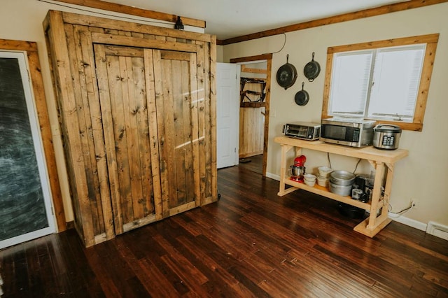 misc room with dark wood-type flooring