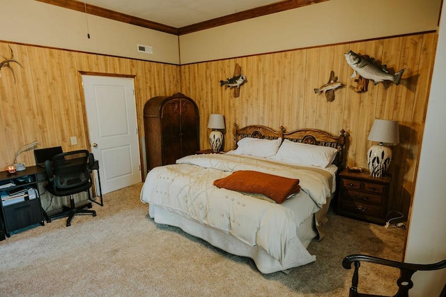 bedroom featuring light colored carpet and wood walls