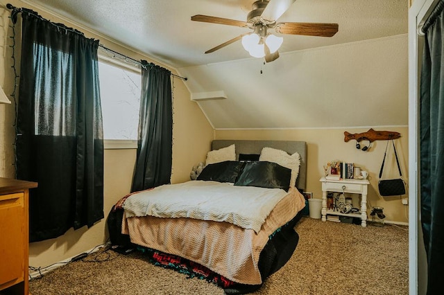 carpeted bedroom featuring lofted ceiling and ceiling fan