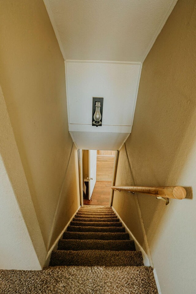 stairs featuring ornamental molding