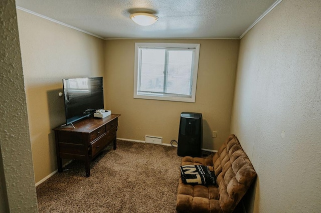 living area with crown molding, carpet floors, and a textured ceiling