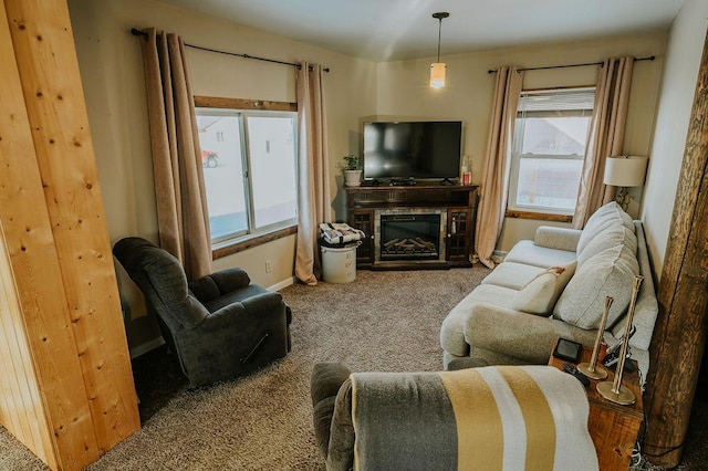 living room with a wealth of natural light and carpet floors