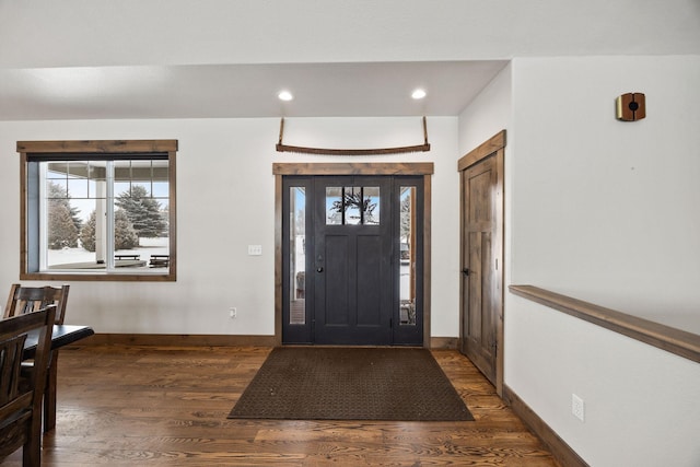 foyer entrance featuring dark hardwood / wood-style flooring