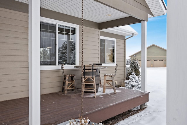 view of snow covered deck