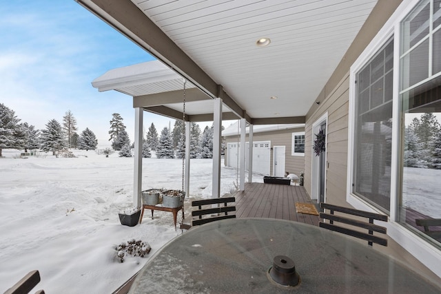 view of snow covered deck