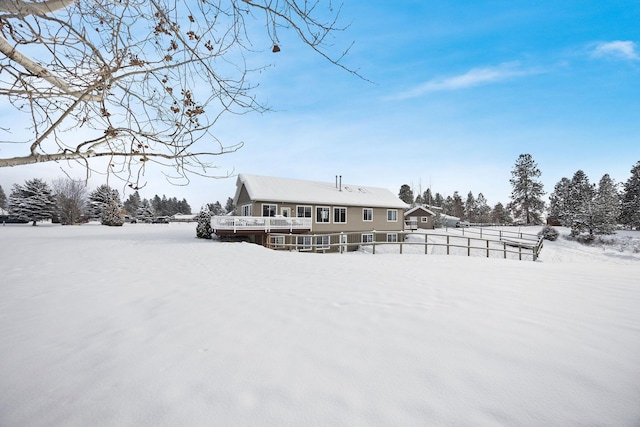 view of snow covered property