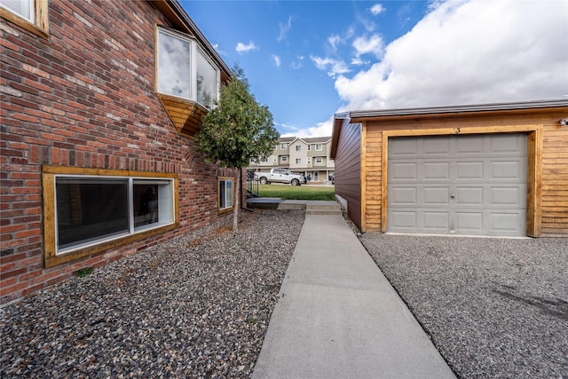 view of side of home with a garage