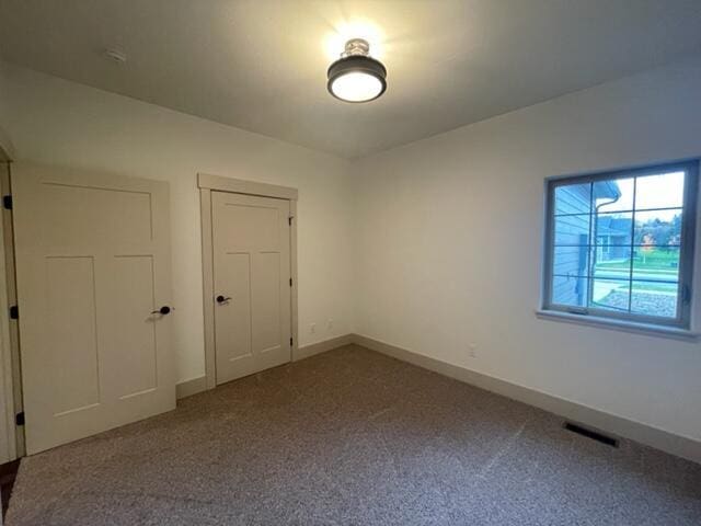 view of carpeted spare room