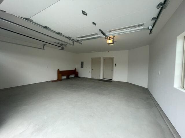 217 Palmer Dr, Kalispell, MT 59901 - garage with a garage door opener and electric panel