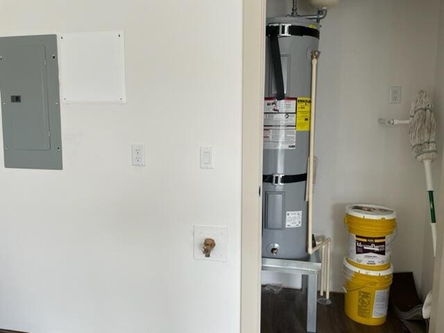 utilities with electric panel and strapped water heater