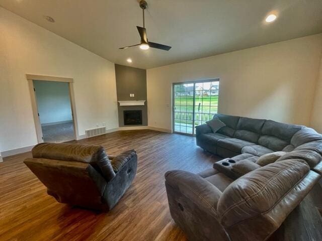 217 Palmer Dr, Kalispell, MT 59901 - living room with ceiling fan, wood finished floors, recessed lighting, a fireplace, and high vaulted ceiling