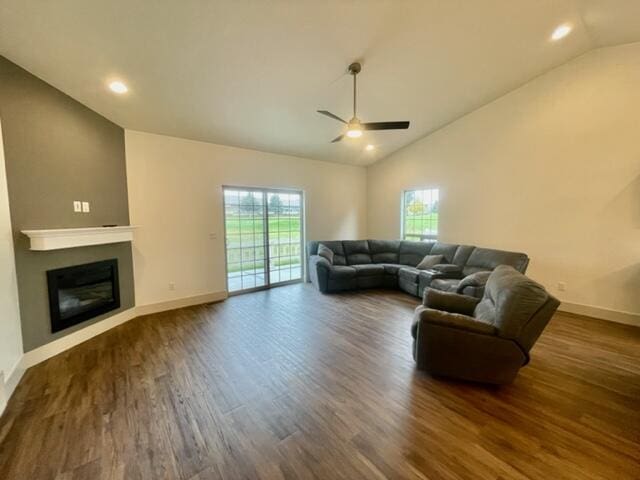 living room with high vaulted ceiling, dark wood-type flooring, and ceiling fan