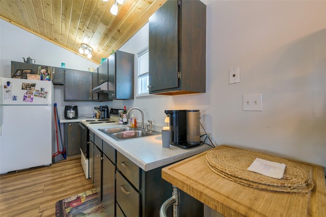 kitchen with sink, wood ceiling, white appliances, light hardwood / wood-style flooring, and vaulted ceiling