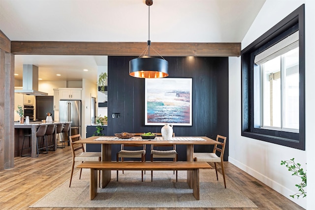 dining area with light hardwood / wood-style flooring