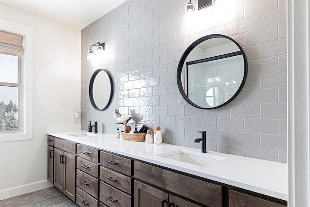 bathroom with vanity, tile walls, and backsplash