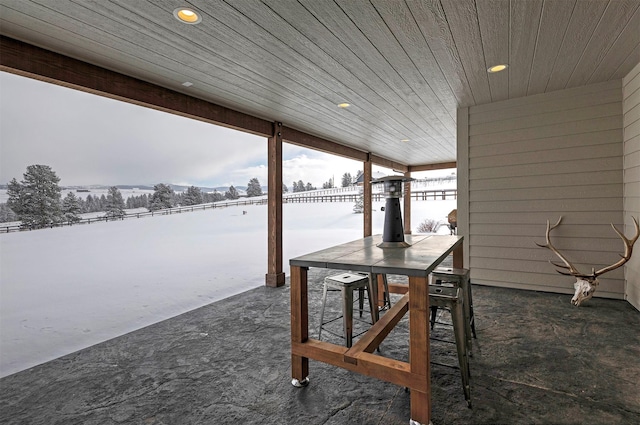 view of snow covered patio