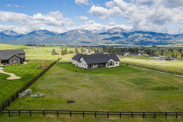 bird's eye view featuring a mountain view and a rural view