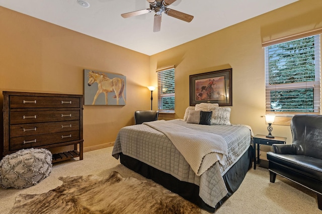 107 Whitetail Ct, Bigfork, MT 59911 - carpeted bedroom featuring baseboards and ceiling fan