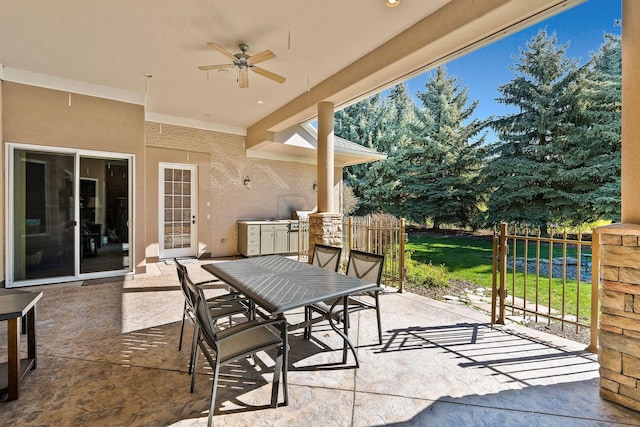 view of patio / terrace with ceiling fan and area for grilling