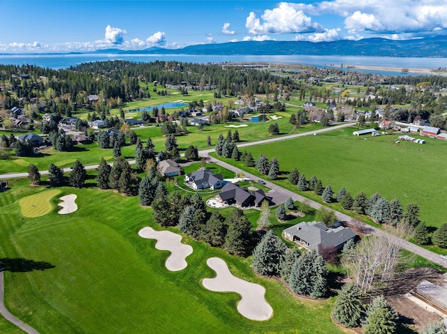 aerial view featuring a water and mountain view