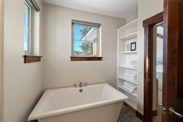 bathroom with a washtub