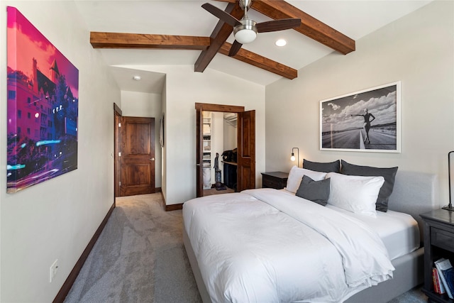 bedroom with vaulted ceiling with beams, a walk in closet, carpet, ceiling fan, and a closet